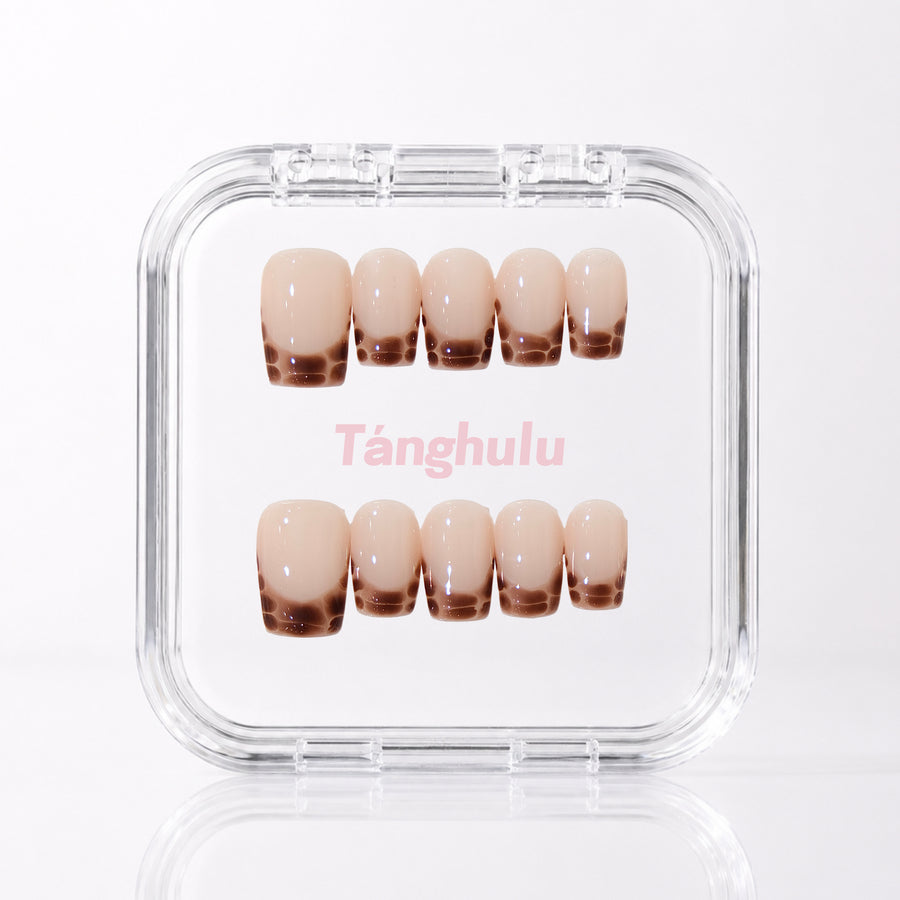 Latte Edge — Short Coffin press-on nails aligned vertically with level cuticle edges in a Tanghulu acrylic case