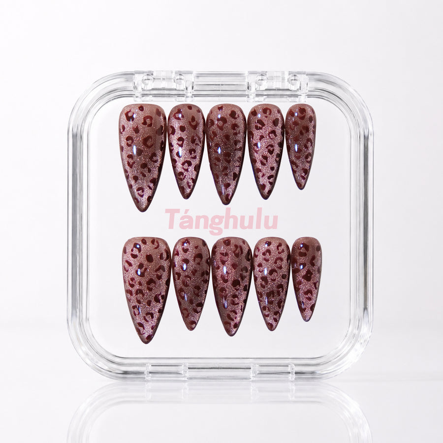 Plum Leopard — Long Stiletto press-on nails aligned vertically with level cuticle edges in a Tanghulu acrylic case