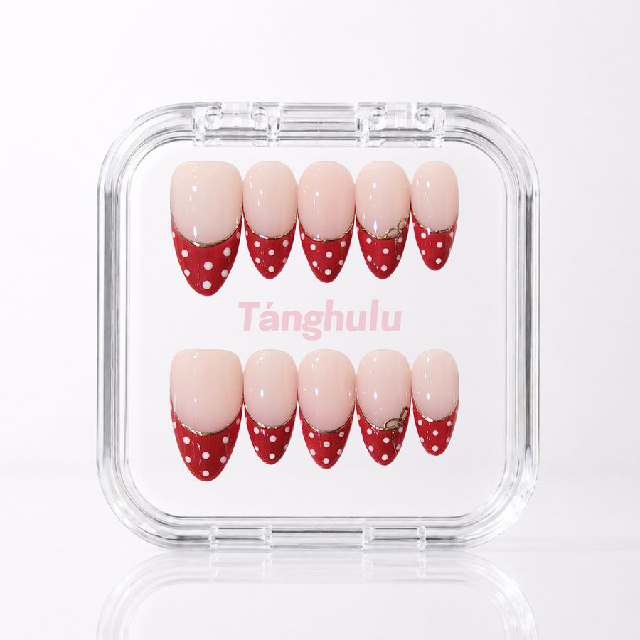 Dottie Red — Medium Almond press-on nails aligned vertically with level cuticle edges in a Tanghulu acrylic case