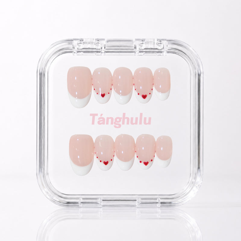 Sweetheart French — Short Oval press-on nails in Tanghulu acrylic case